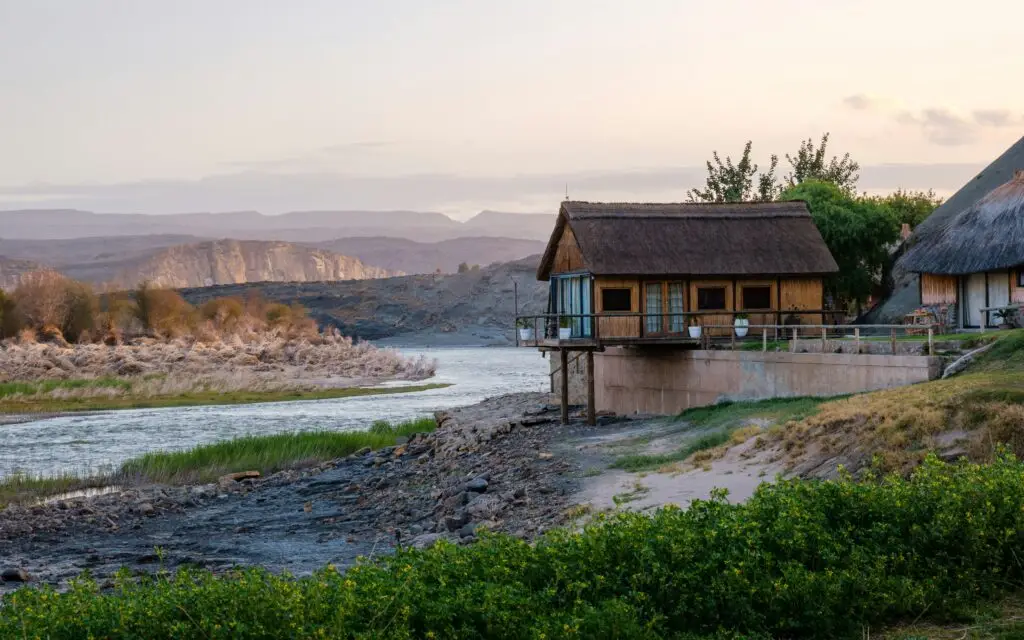 a house on a hill by a river a house on a hill by a river